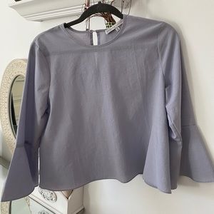 Light blue bell sleeve top